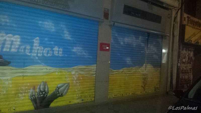 Cierre nocturno con grafiti en Ponzano